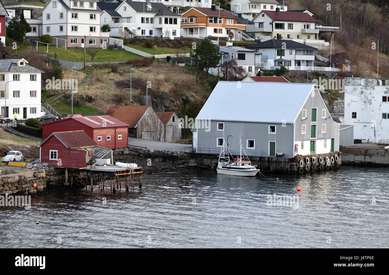 Boathouses and warehouses on the waterfront of Måløy on the island of Vågsøy. Måløy,  Sogn og Fjordane, Norway. Stock Photo