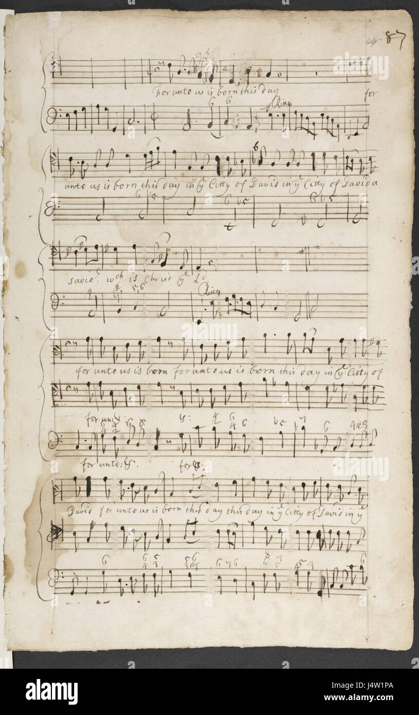 This image is from a manuscript by William Raylton, featuring the phrase 'Behold, I bring you glad tidings.' The manuscript is part of the British Library collection, illustrating 16th-century English script and religious themes. Stock Photo