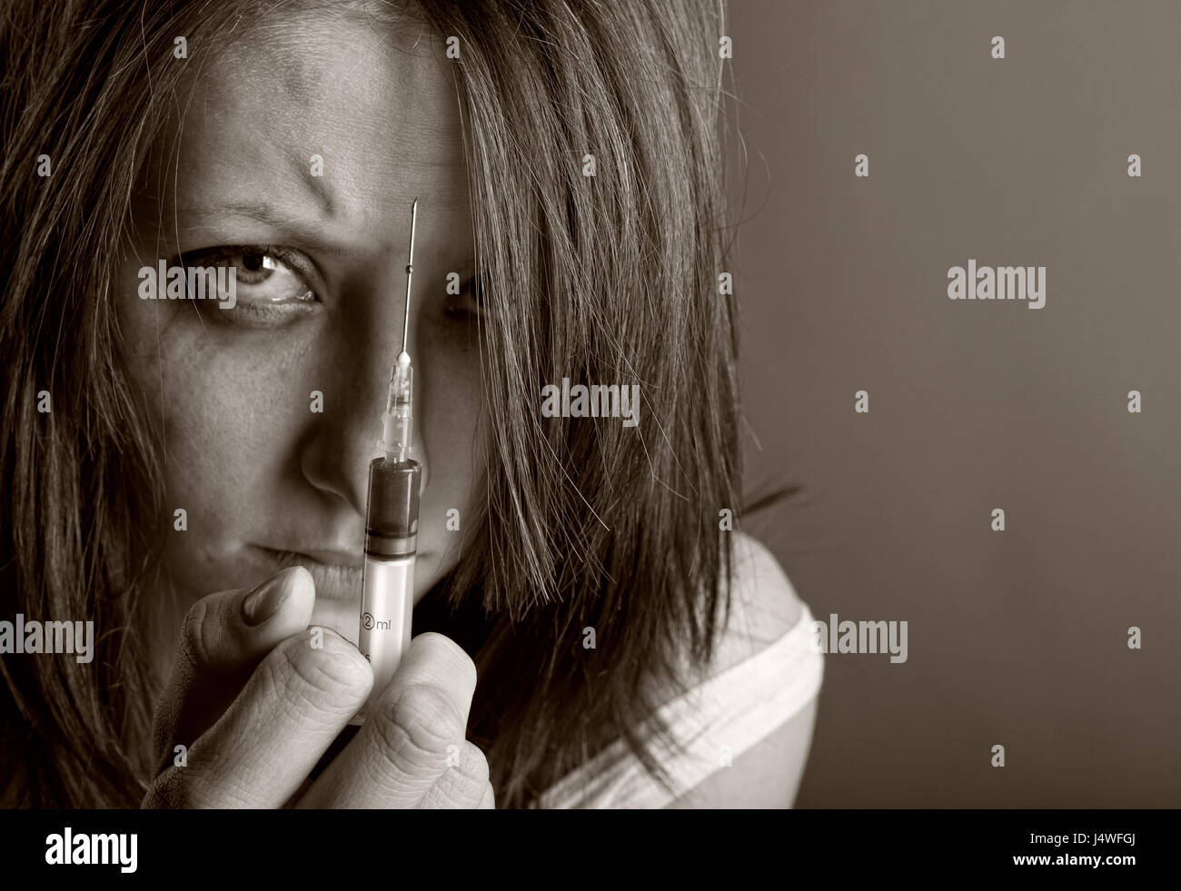 Young woman with drug addiction. Black and white photo Stock Photo