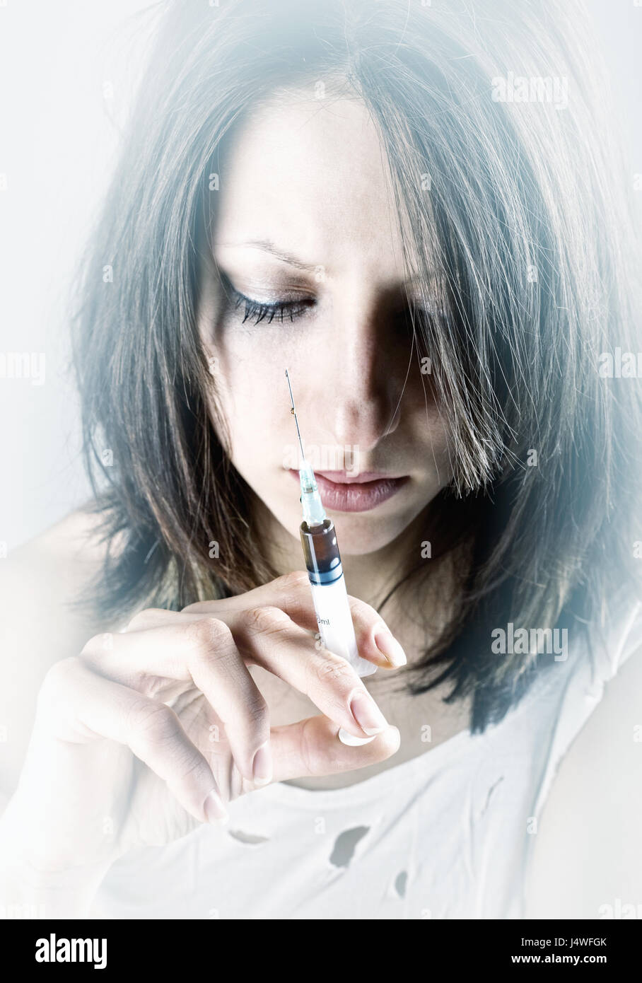 Young woman with drug addiction Stock Photo