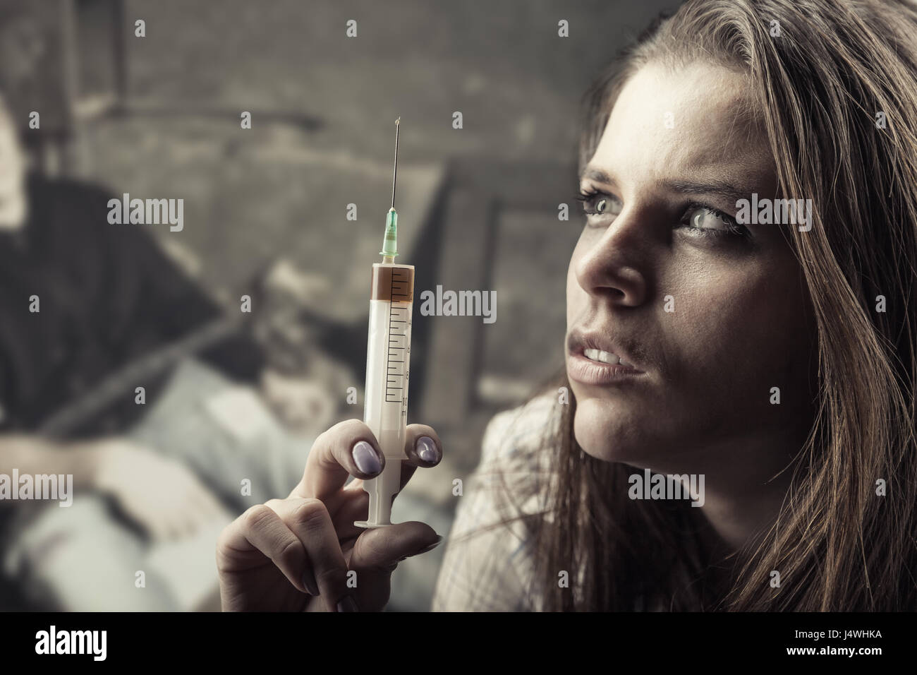 Drug addiction. Young woman with drug addiction Stock Photo