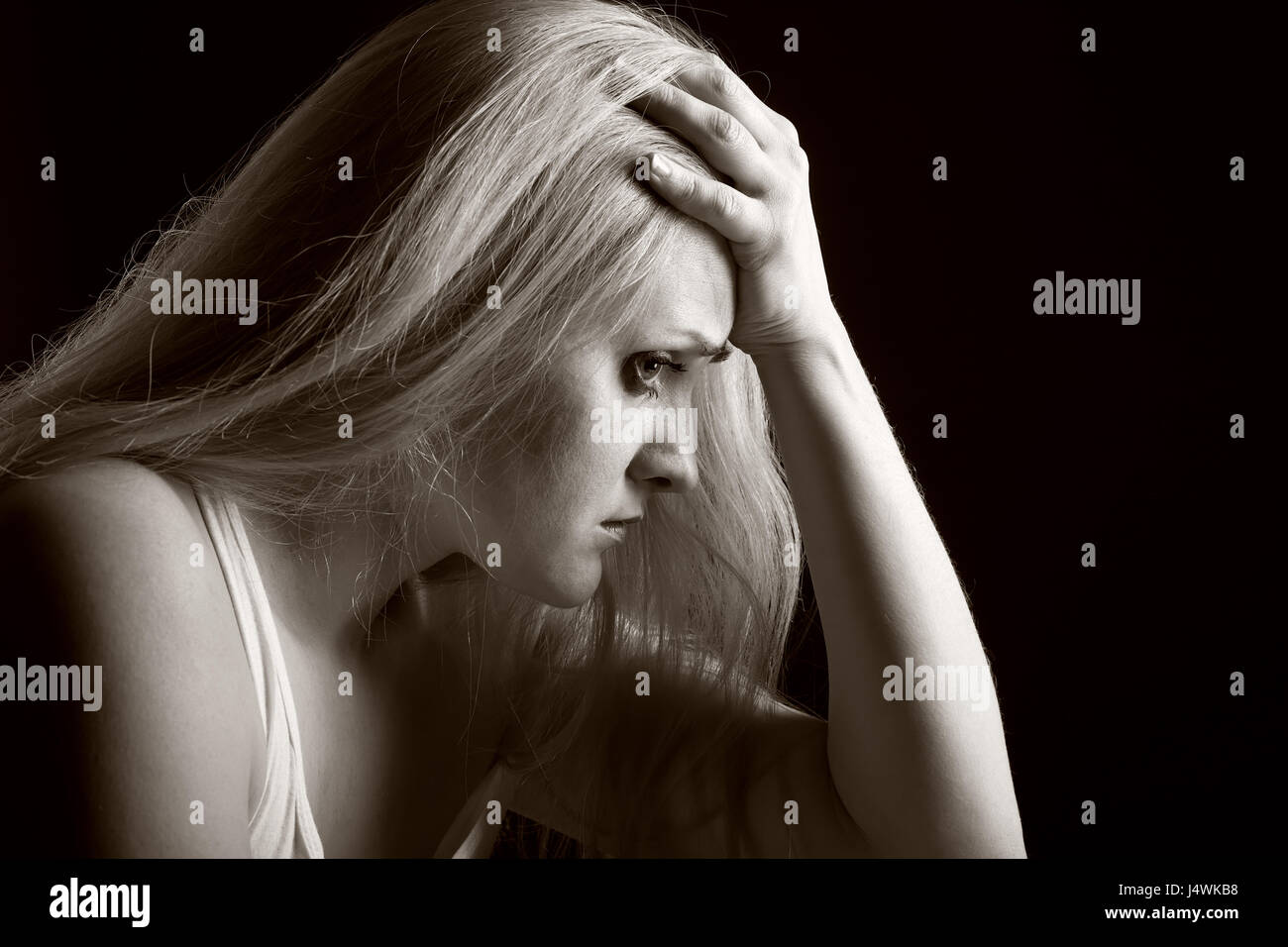 Portrait of a sad young woman. Black and white photo Stock Photo