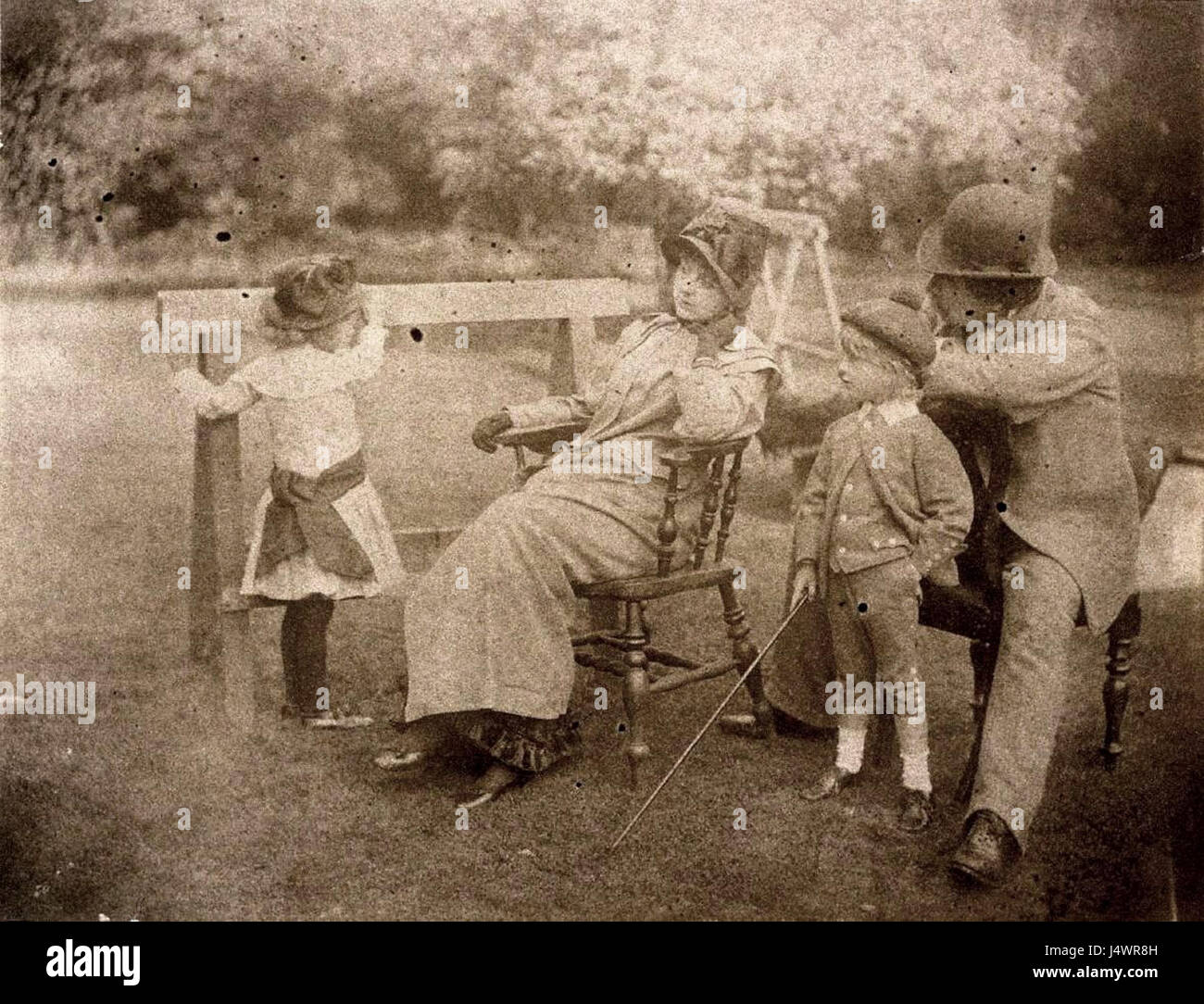 'Tissot and Newton in Garden' depicts two prominent figures, likely ...
