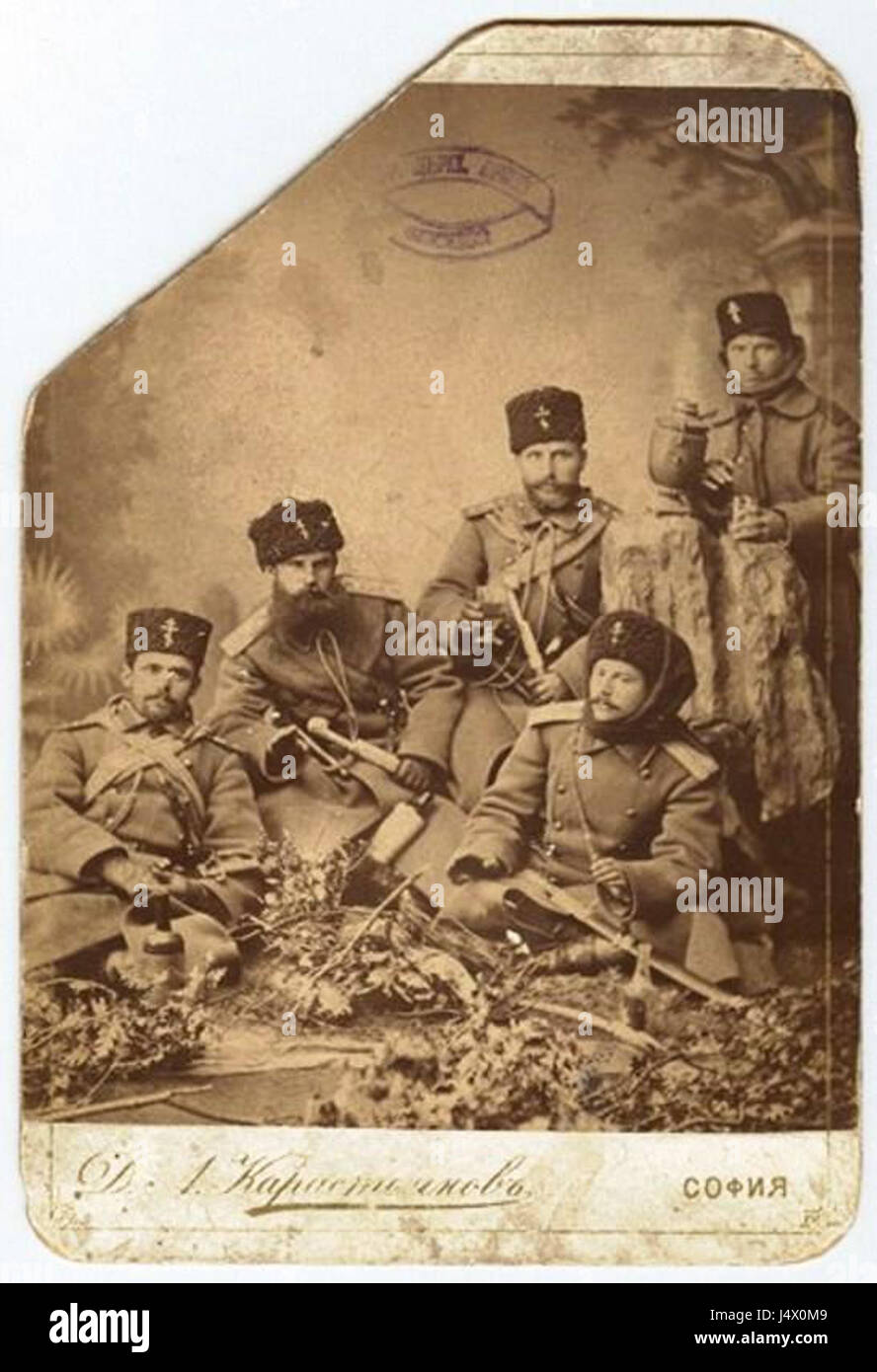 Vladimir Serafimov (sitting with a scarf over the head) with other soldiers from the Serbo Bulgarian War Stock Photo