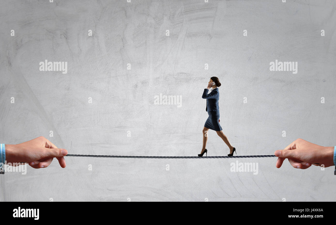 Walking on hands tightrope hi-res stock photography and images - Alamy