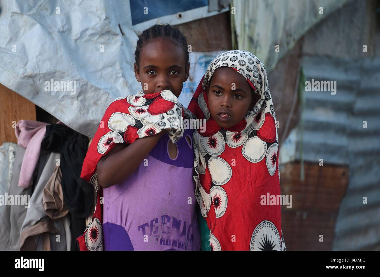 Children in an internally displaced person (IDP) camp in Hargeisa, Somaliland where families have had to leave their homes in villages move to the city in order to find food and water after recent drought. Stock Photo