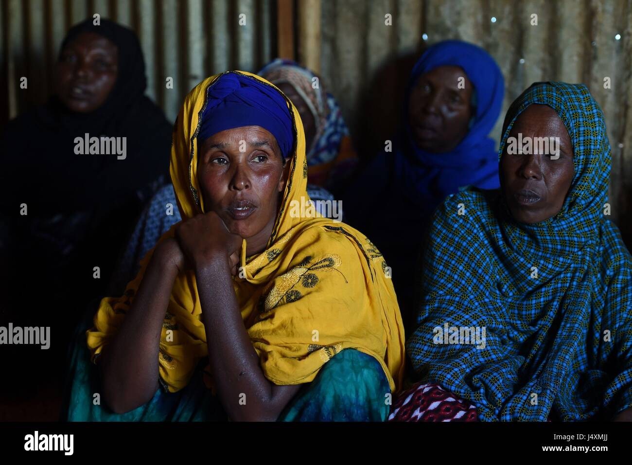 Woman are pictured in an internally displaced person (IDP) camp in Hargeisa, Somaliland where families have had to leave their homes in villages move to the city in order to find food and water after recent drought. Stock Photo