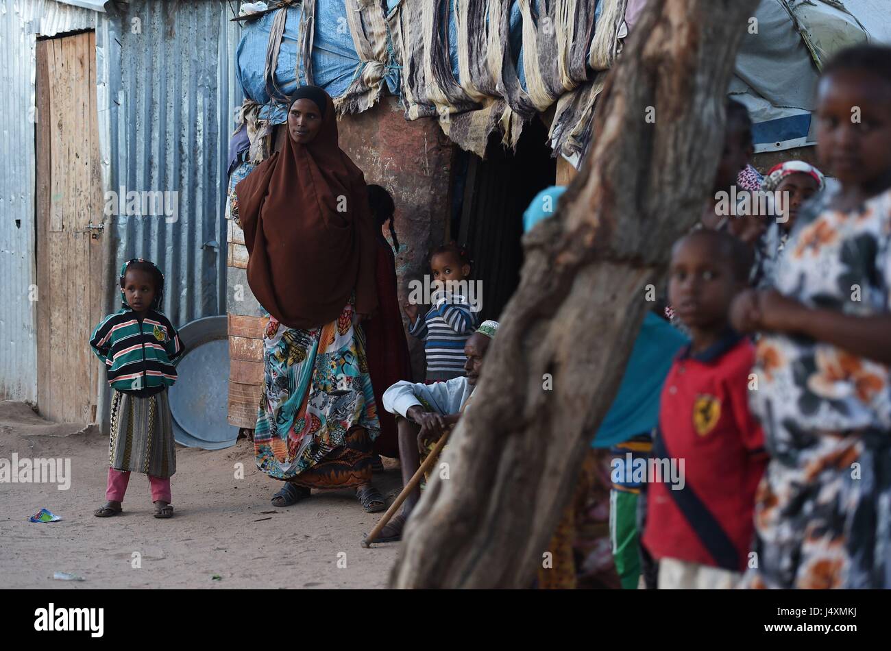 Women and children in an internally displaced person (IDP) camp in Hargeisa, Somaliland where families have had to leave their homes in villages move to the city in order to find food and water after recent drought. Stock Photo