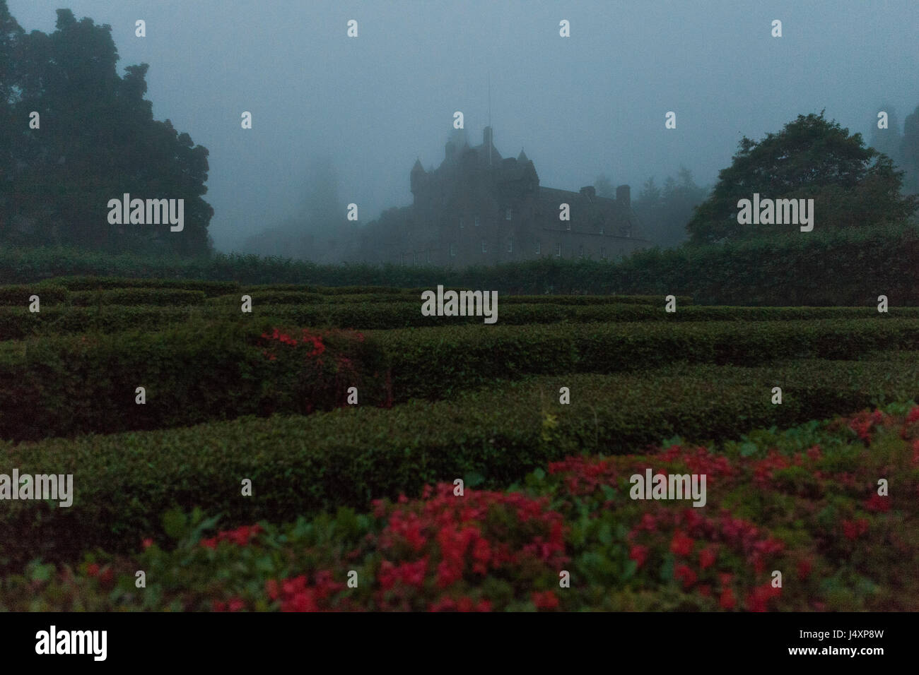 A view of Cawdor Castle in the early morning mist, Nairnshire, Scotland. Derek Hudson / Alamy Stock Photo Stock Photo