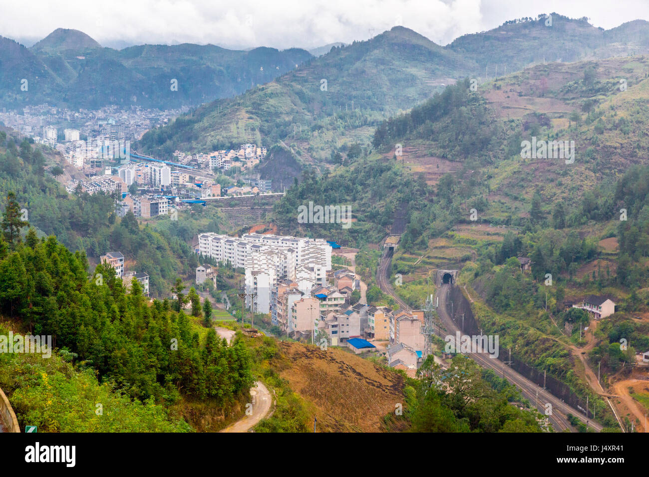 Guizhou, China, Approaching Zhenyuan.  Urban Growth Spreads out from the Town Center. Stock Photo