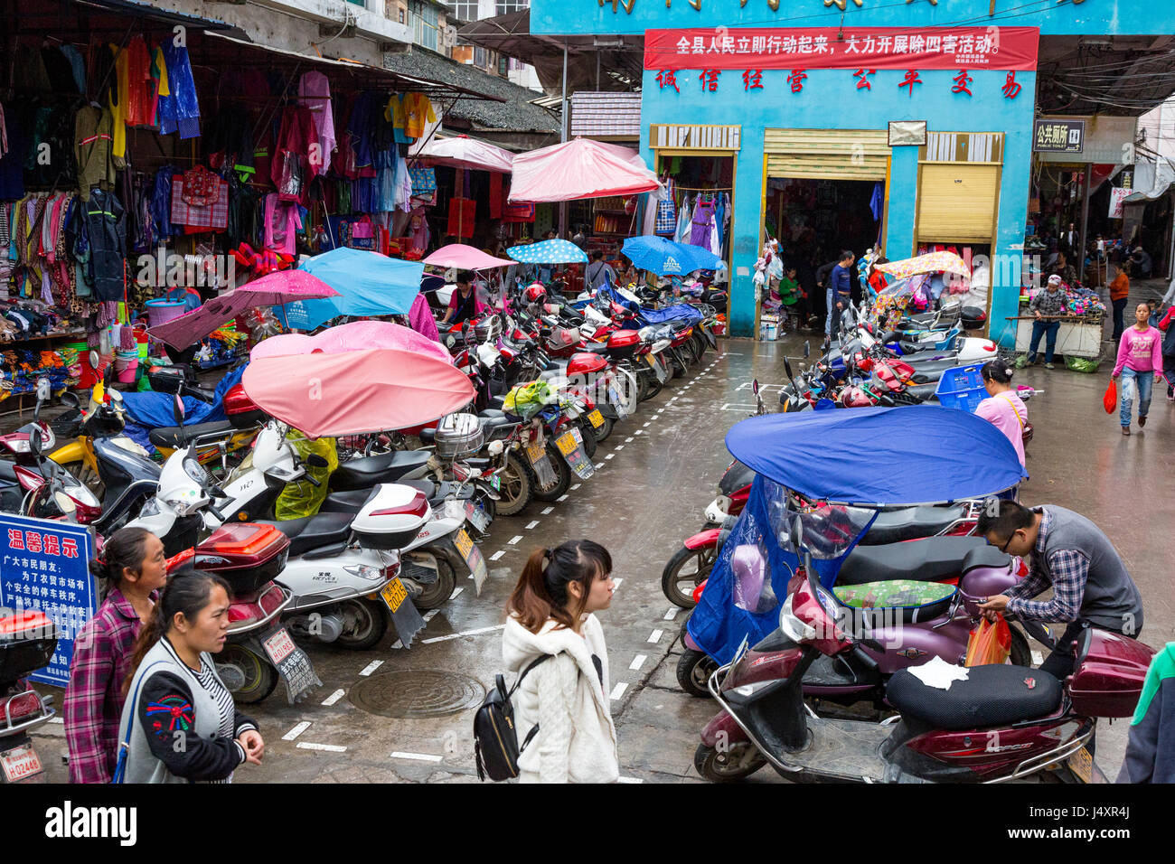 Zhenyuan, Guizhou, China.  Parking Area for Motorbikes and Motorscooters. Stock Photo