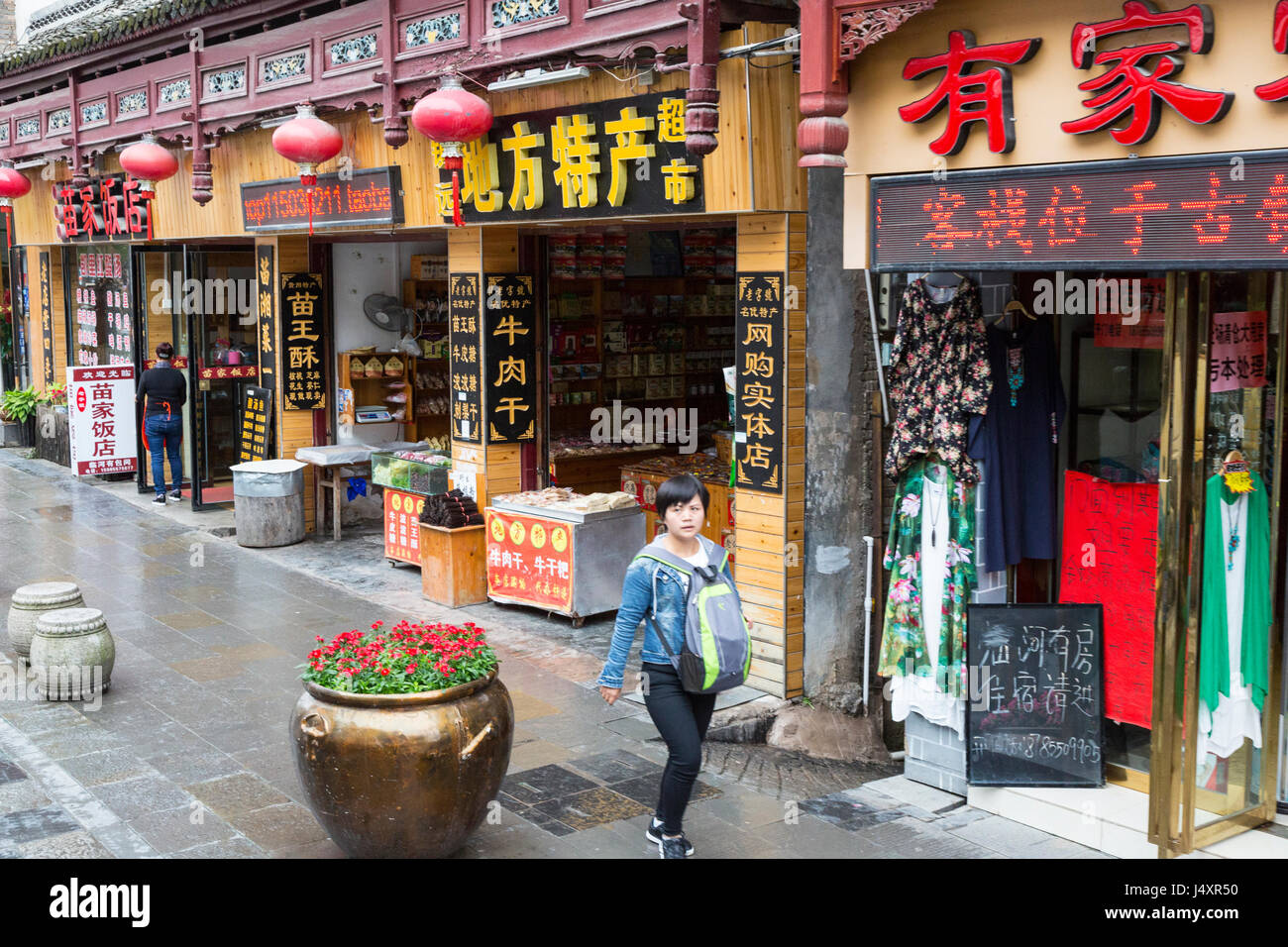 Zhenyuan, Guizhou, China.  Street Scene in Modern Zhenyuan, with Open-front Shops. Stock Photo