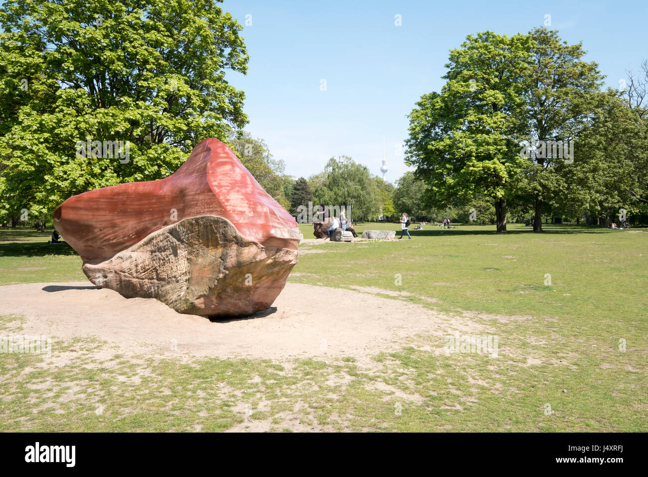 people relaxing in the Tiergarten by the Global Stone Project, Berlin, Germany Stock Photo
