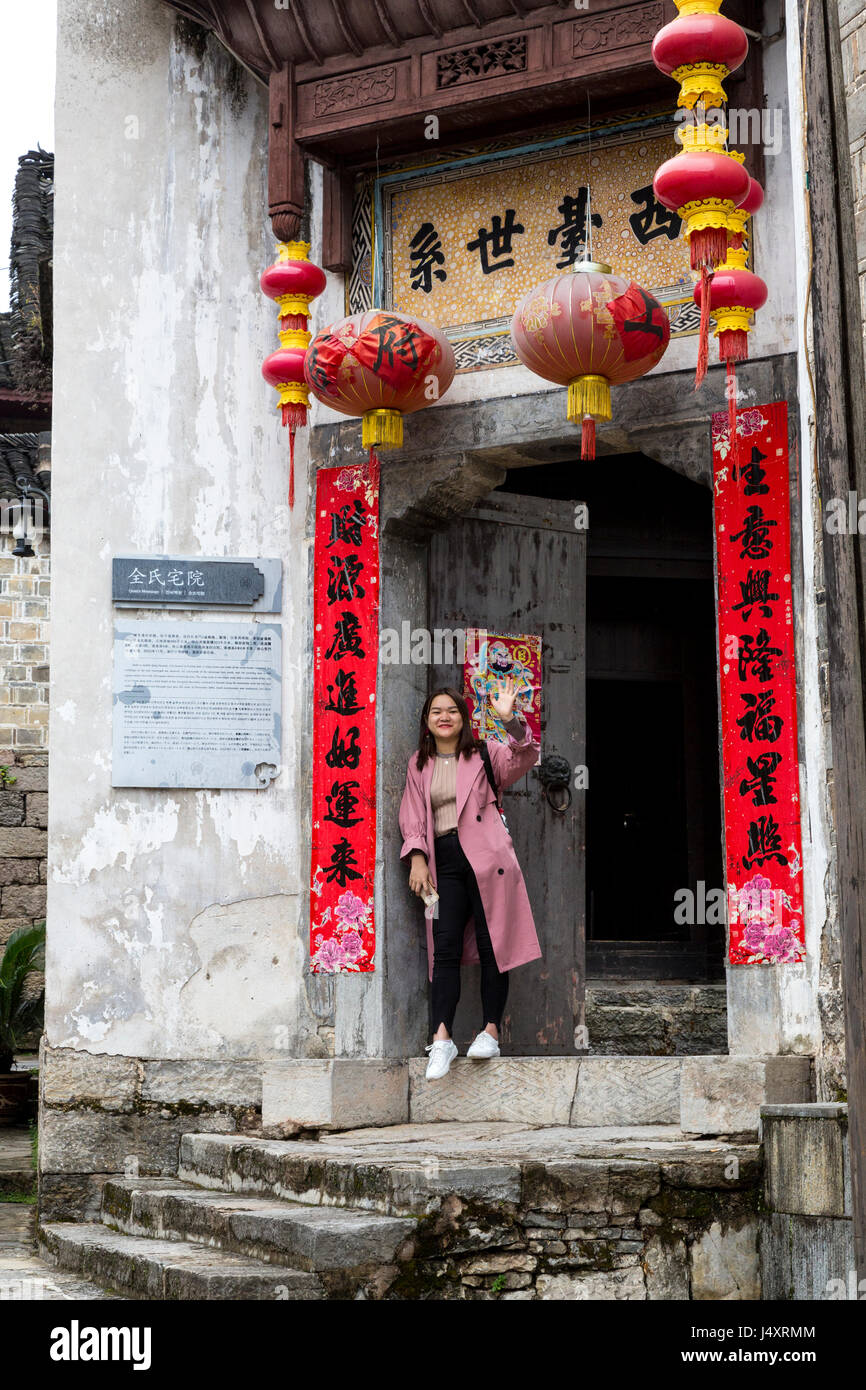 Zhenyuan, Guizhou, China.  Entrance to a Restaurant.  Spring Festival (New Year) Scrolls Line the Entrance. Stock Photo