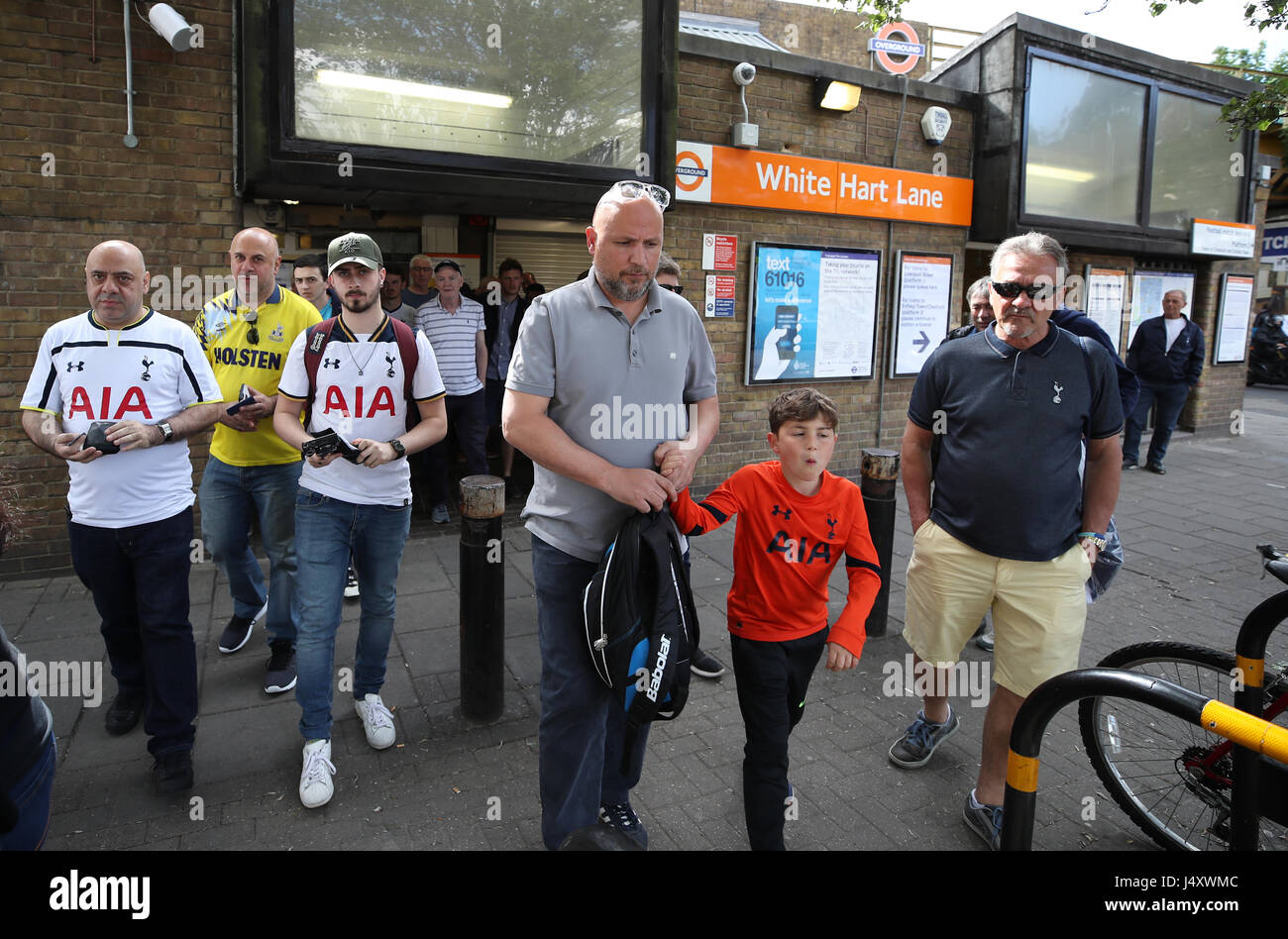 Fans make their way to the stadium prior to the Premier League match at