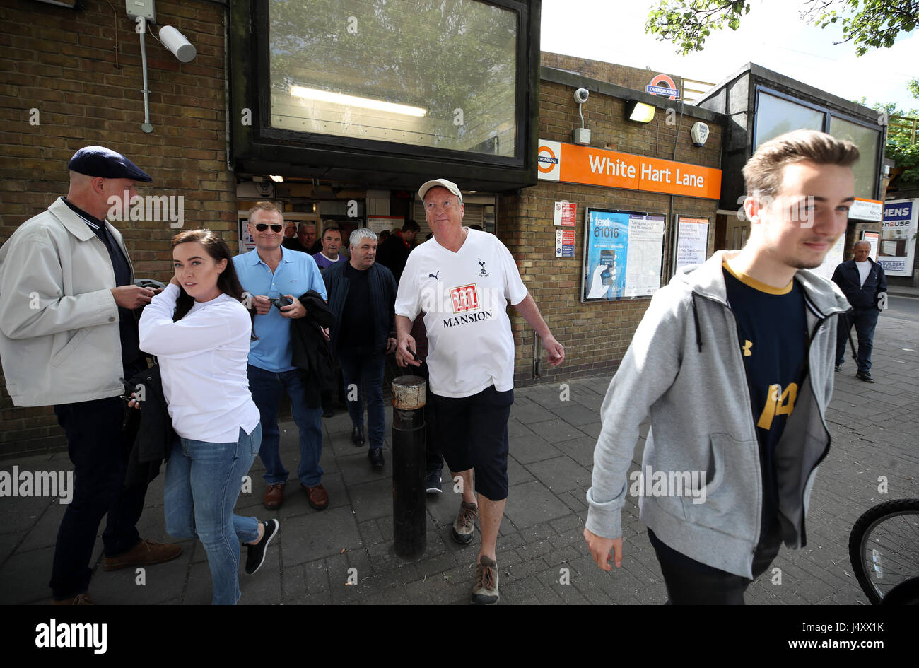 Fans arrive at White Hart lane underground station prior to the Premier League match at White