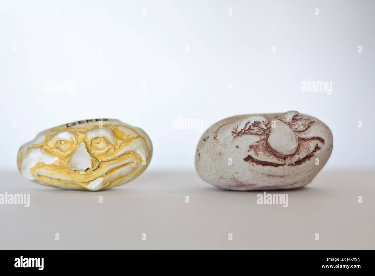 Two stone faces Stock Photo - Alamy