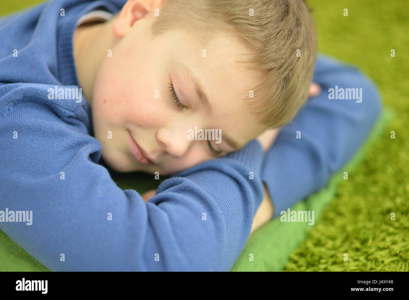 Cute sleeping teenage boy close-up Stock Photo