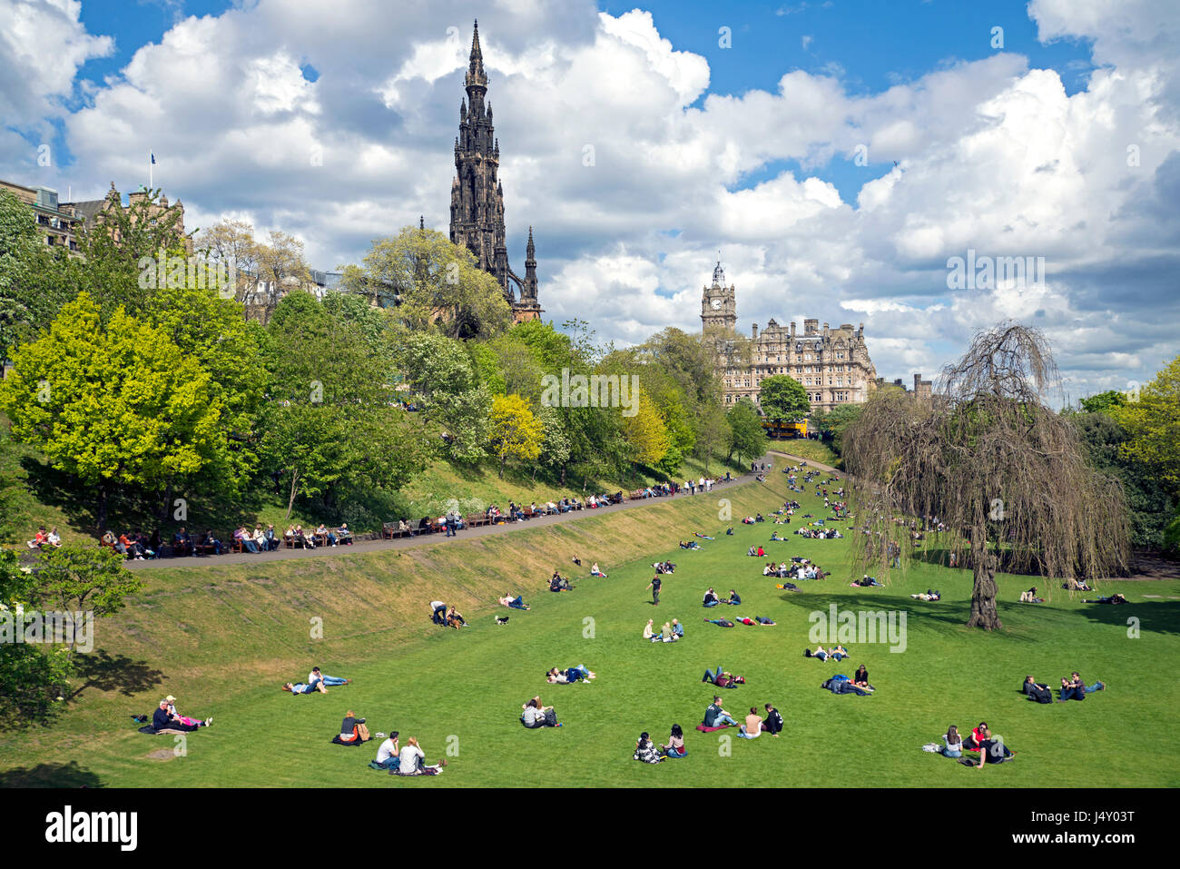 Princes Street Gardens in the centre of Edinburgh with the Scott Monument and Balmoral Hotel in the background. Stock Photo