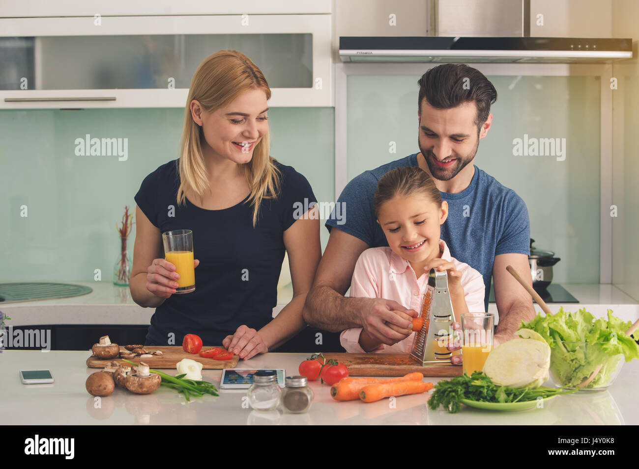 Family Cooking Meal Food Preparation Together Indoor Stock Photo - Alamy