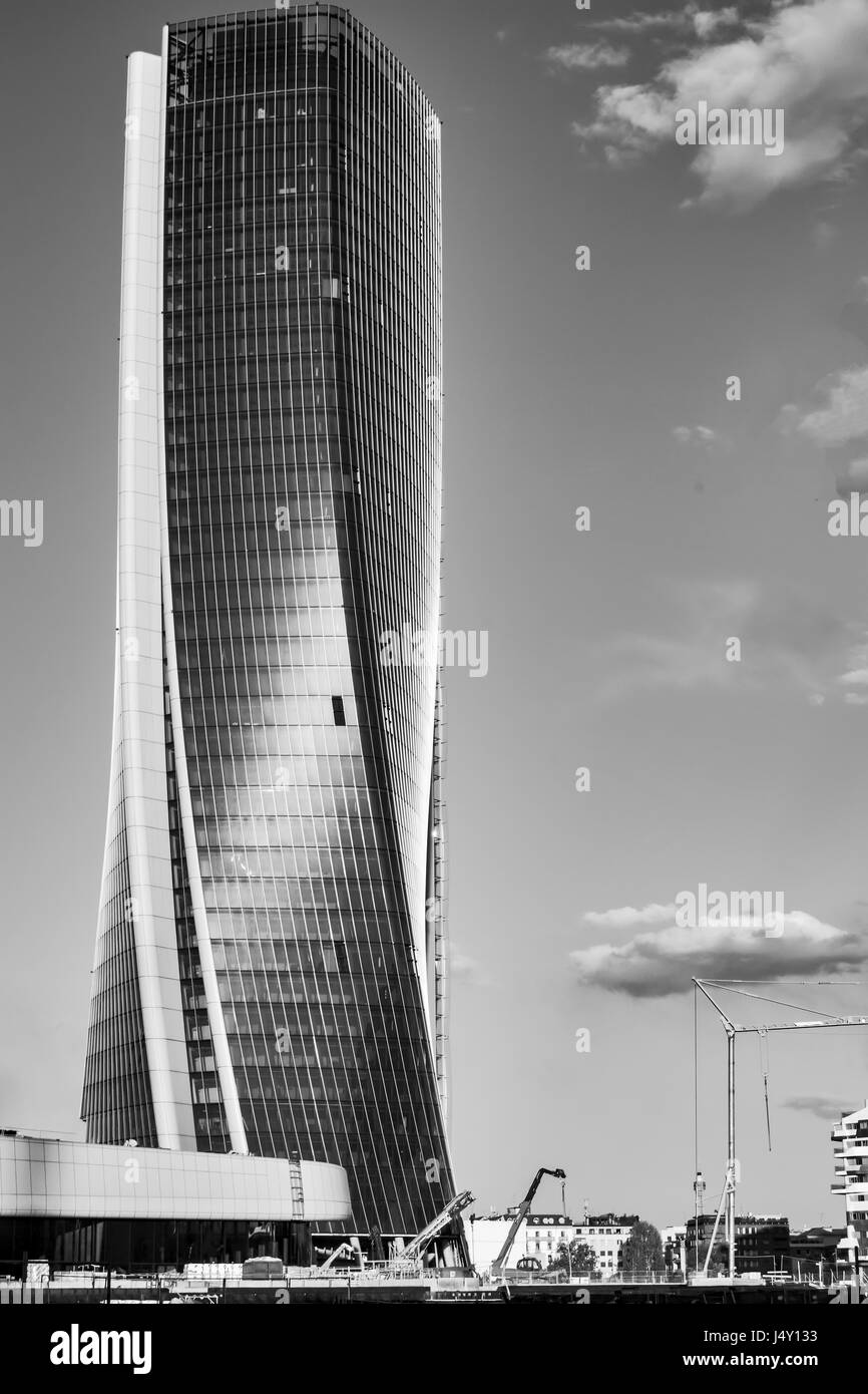 a view of a curved skyscraper in Milan city (black and white version) Stock Photo