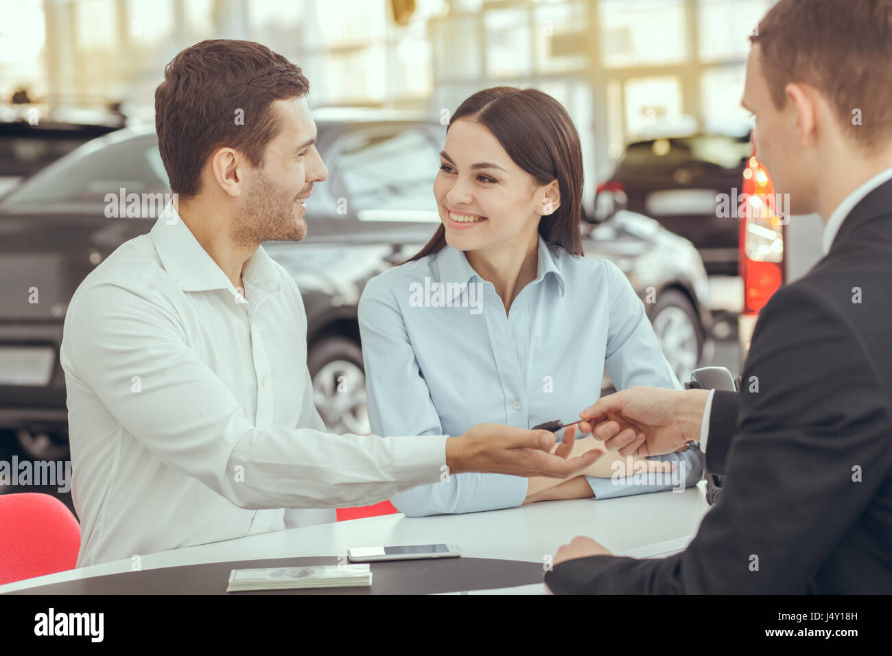 Young People in a Car Rental Service Transportation Concept Stock Photo ...