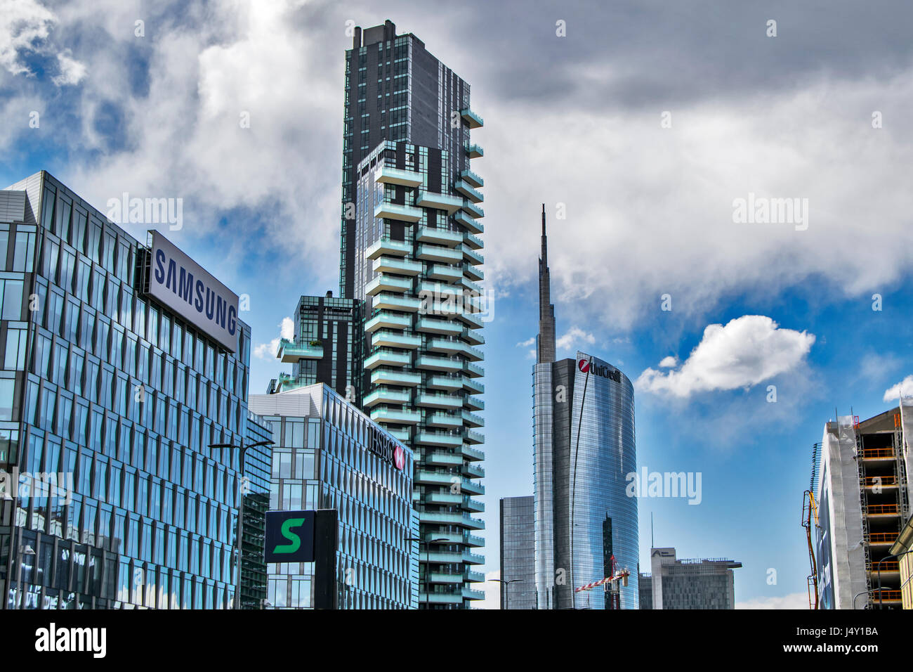 view on facades of modern buildings in milan downtown, with unicredit tower on background Stock Photo