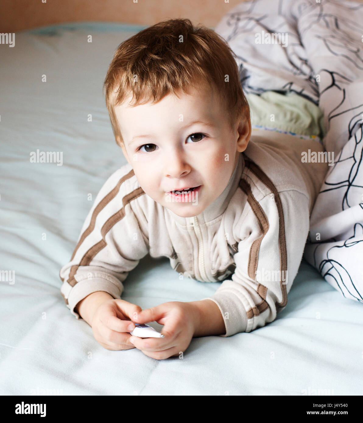 little cute boy in bed , lifestyle people concept Stock Photo Alamy