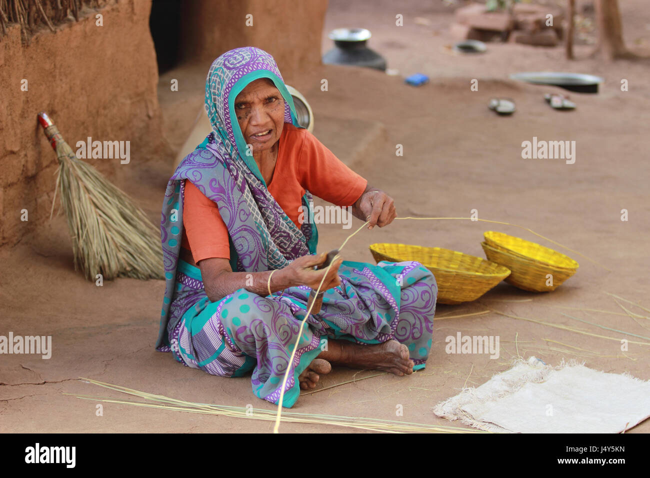 Woman making cane basket. Kawant, Gujarat, India Stock Photo Alamy