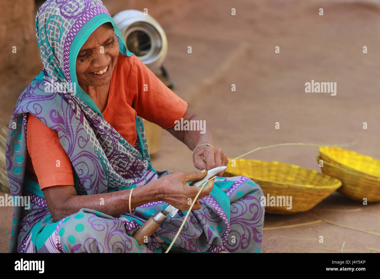 Woman making bamboo cane basket hires stock photography and images Alamy