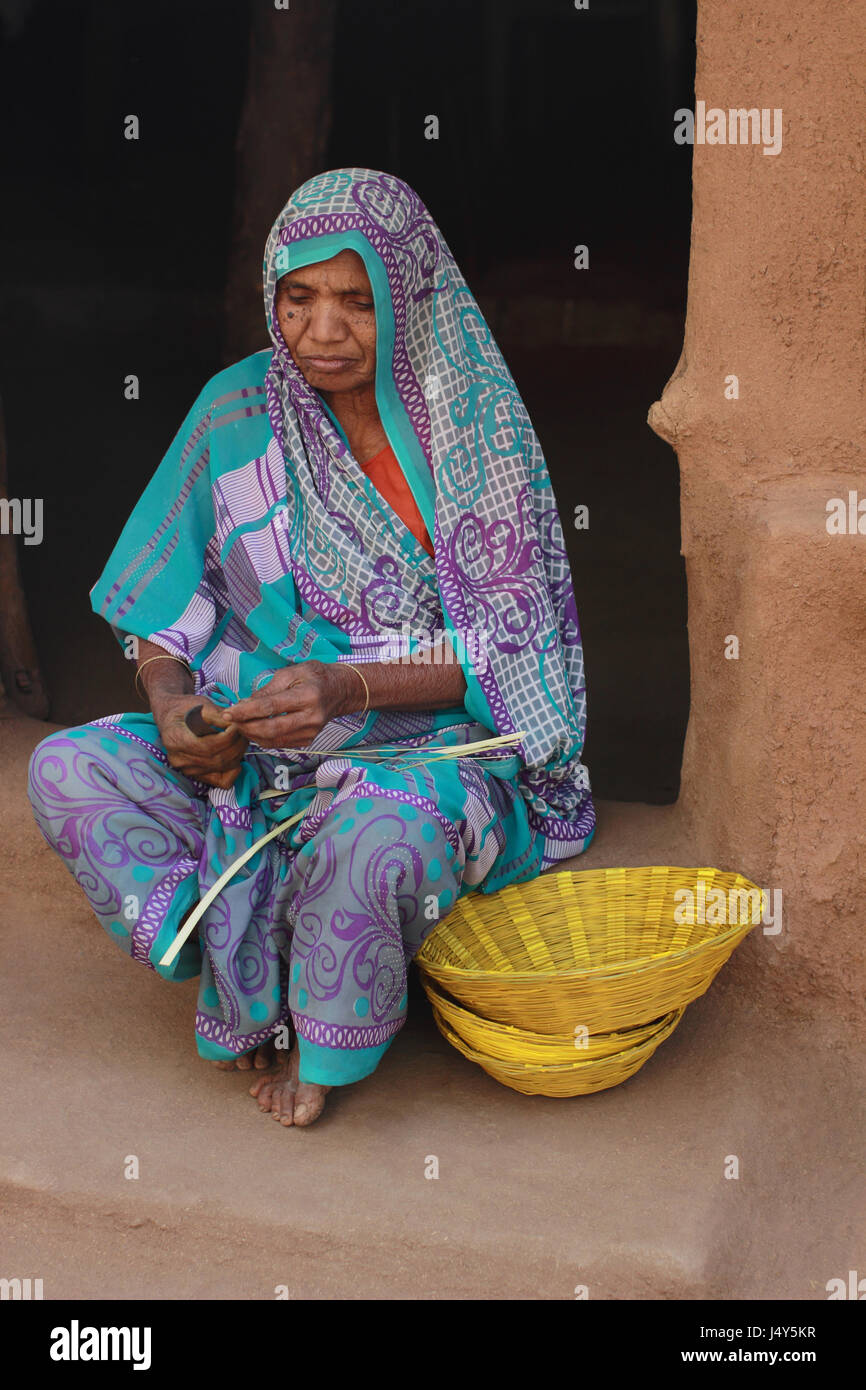 Woman making cane basket. Kawant, Gujarat, India Stock Photo Alamy