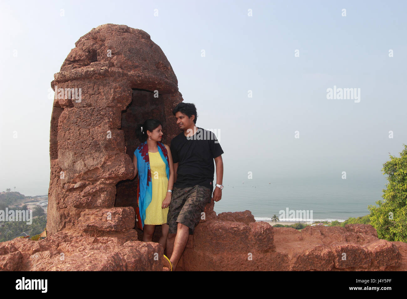 Couple , Chapora Fort in Goa, India Stock Photo