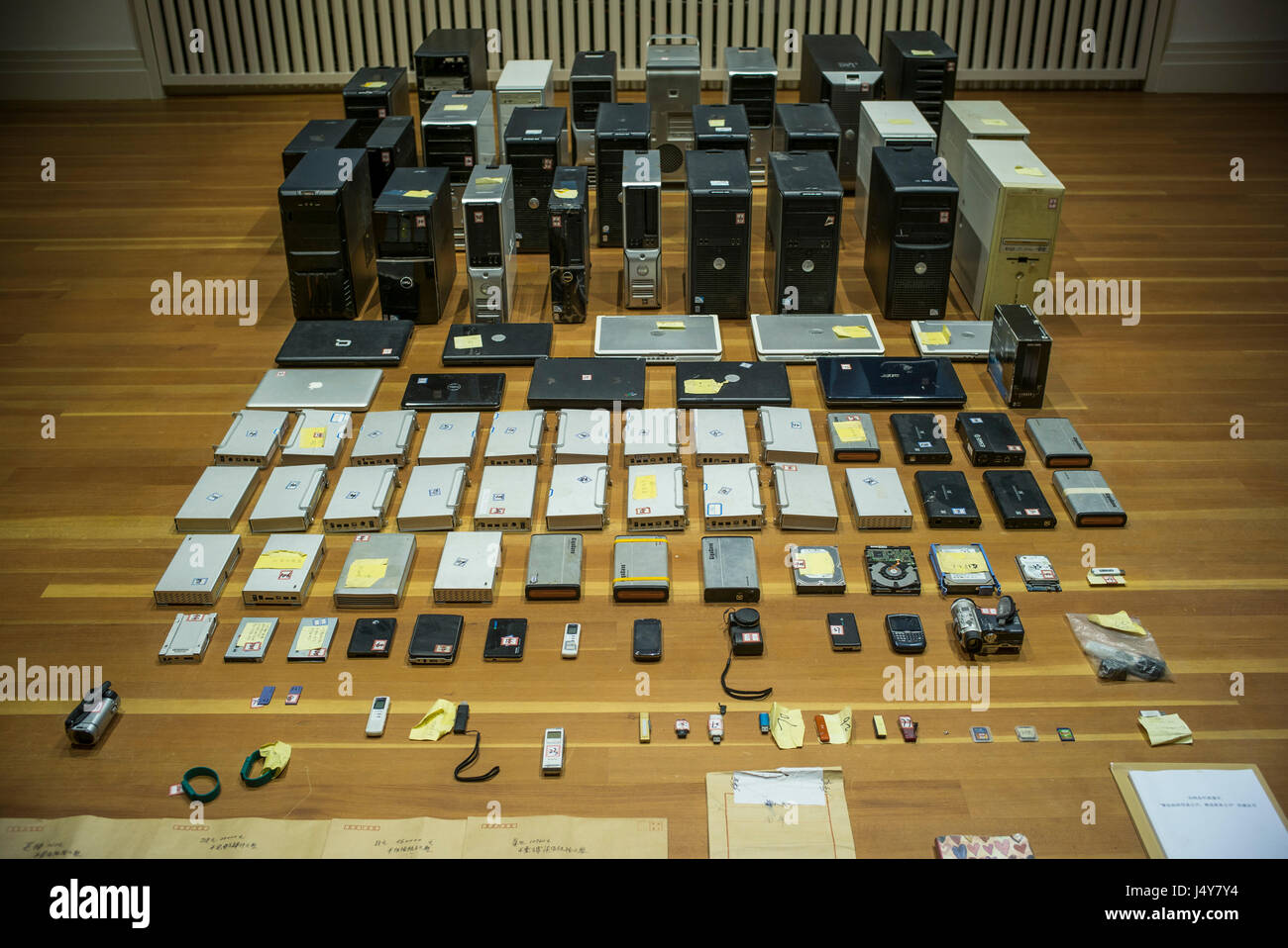 Computers, hard drives, and assorted electronic items, part of Chinese artist Ai Wewei's 'Evidence' exhibition at the Martin Gropius museum. Stock Photo