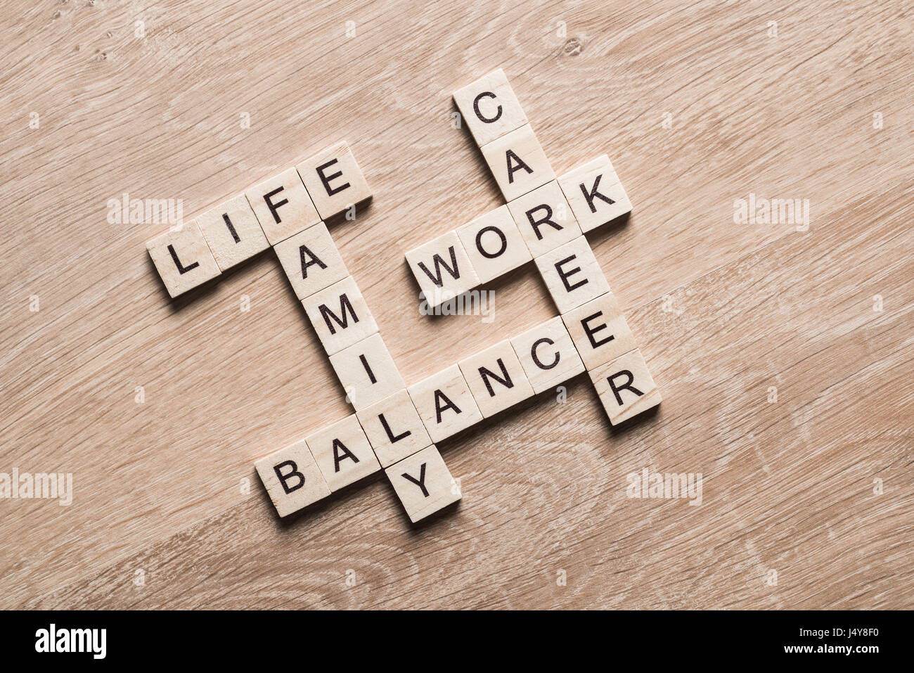 Words work life balance and family on table collected with wooden cubes ...