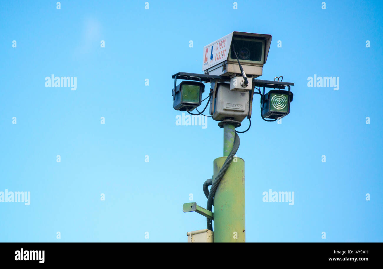 CCTV Camera against a blue sky Stock Photo