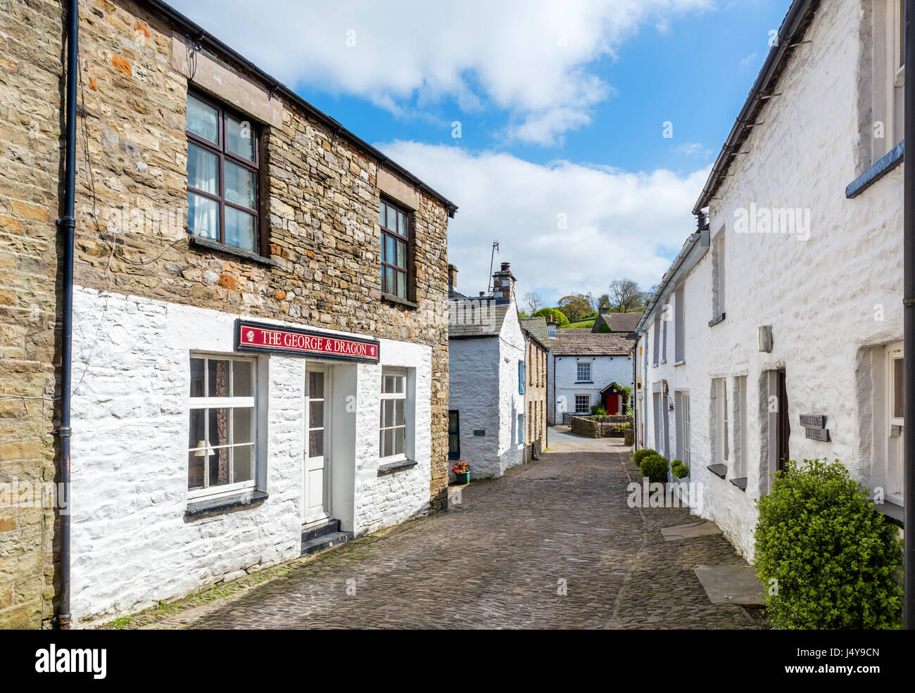 Cobbled street in the traditional English village of Dent, Dentdale,  Yorkshire Dales National Park, North Yorkshire, England, UK. Stock Photo