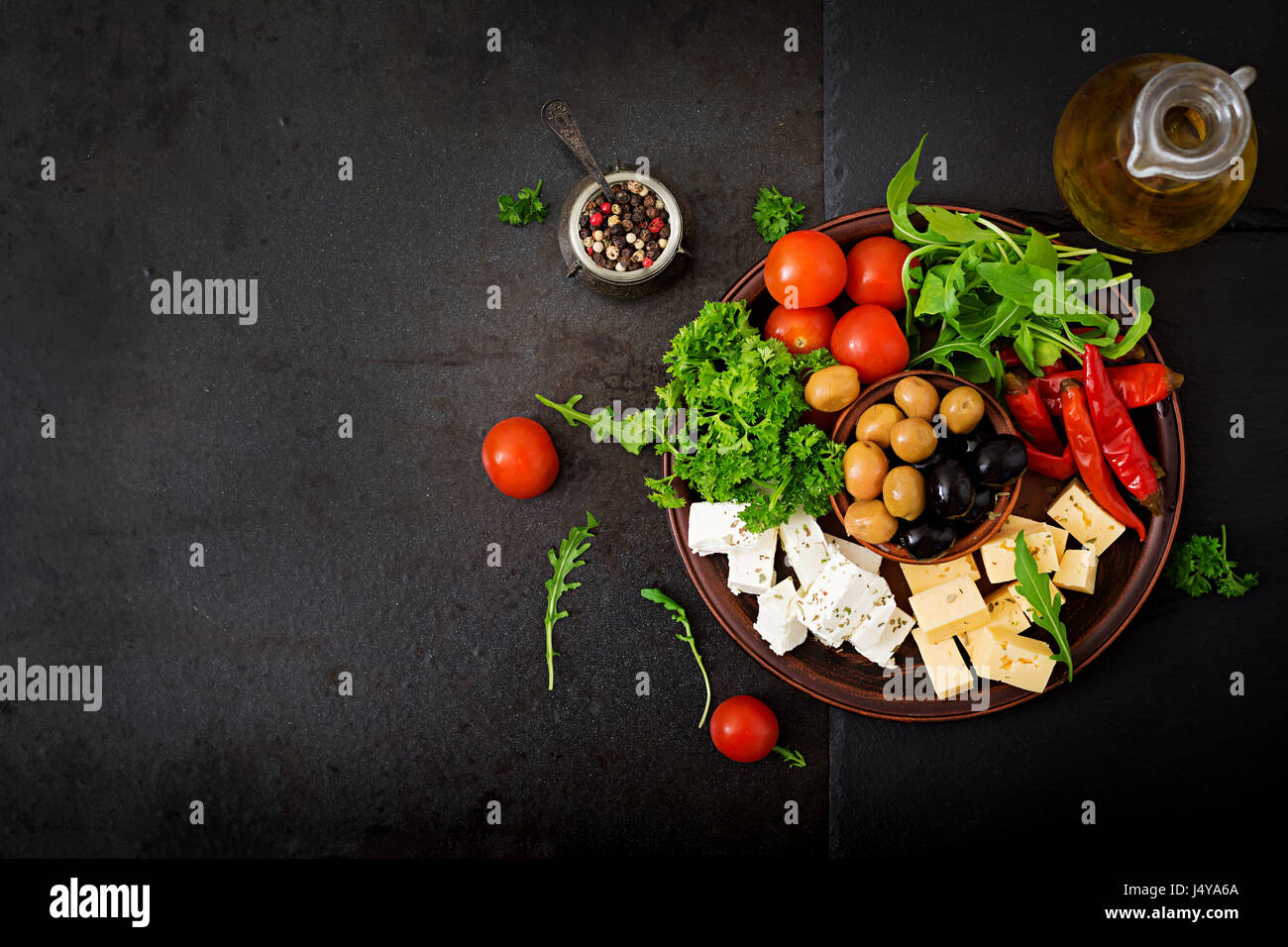 Diner platter olives, cheese and vegetables Stock Photo Alamy