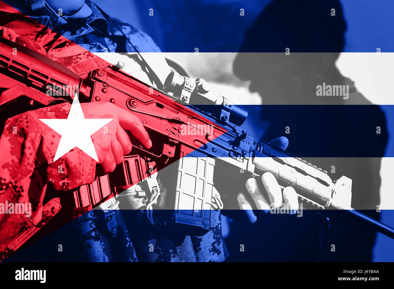 Soldier with machine gun with national flag of Cuba Stock Photo