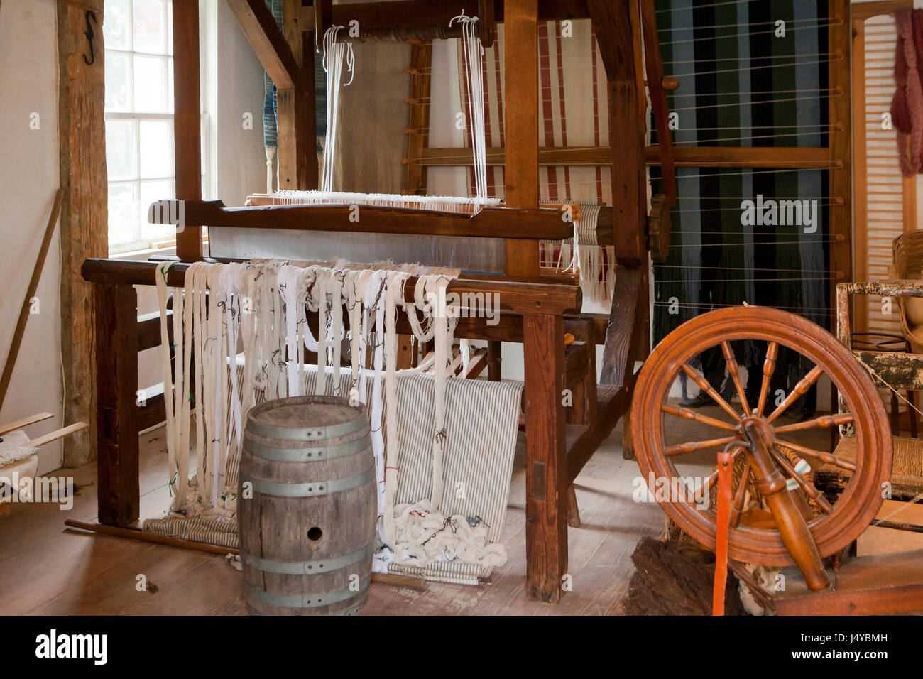 Depiction of a weaver's cottage in the 18th century colonial America - USA Stock Photo