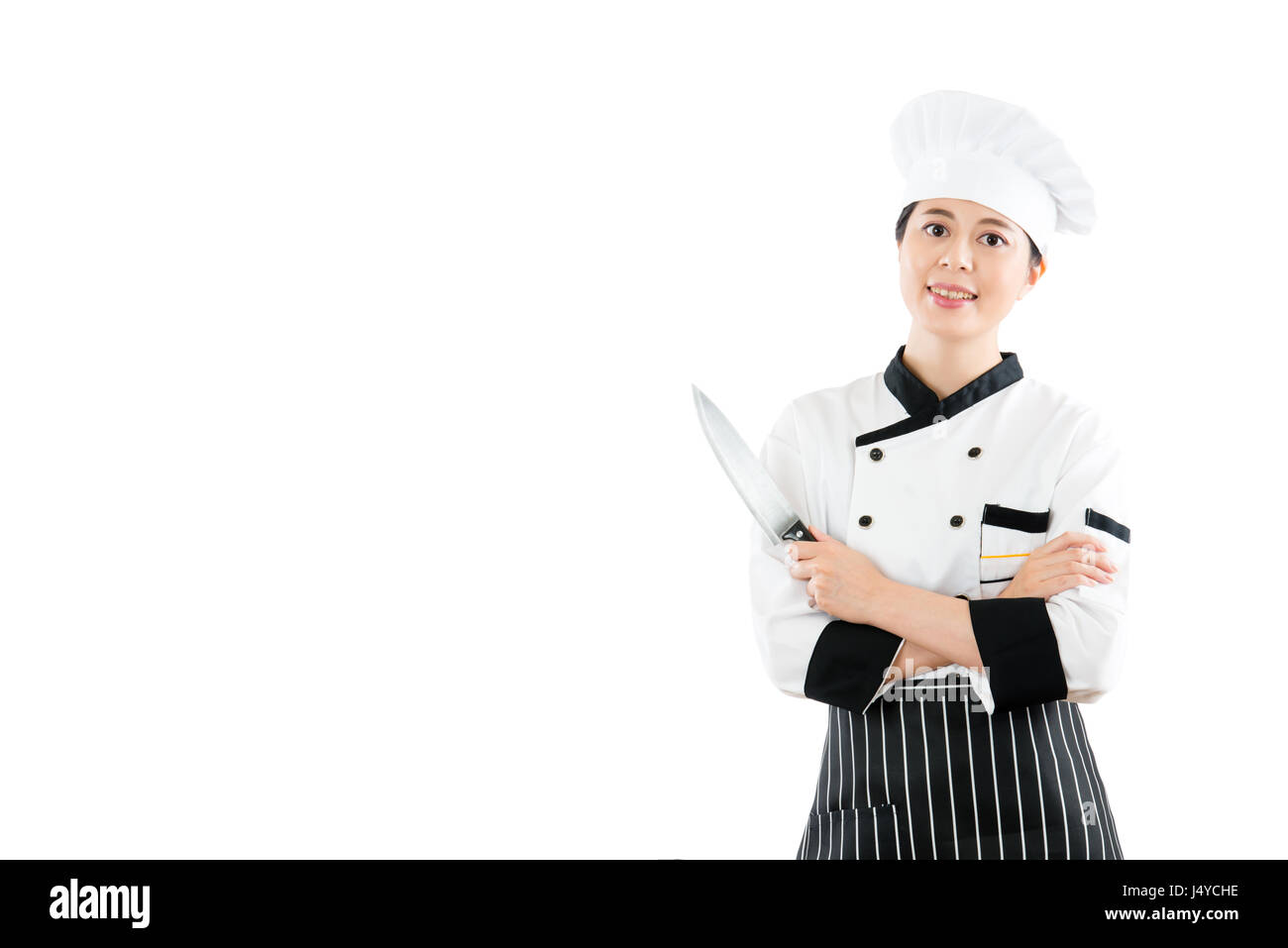 Chef posing knife in kitchen hi-res stock photography and images - Alamy