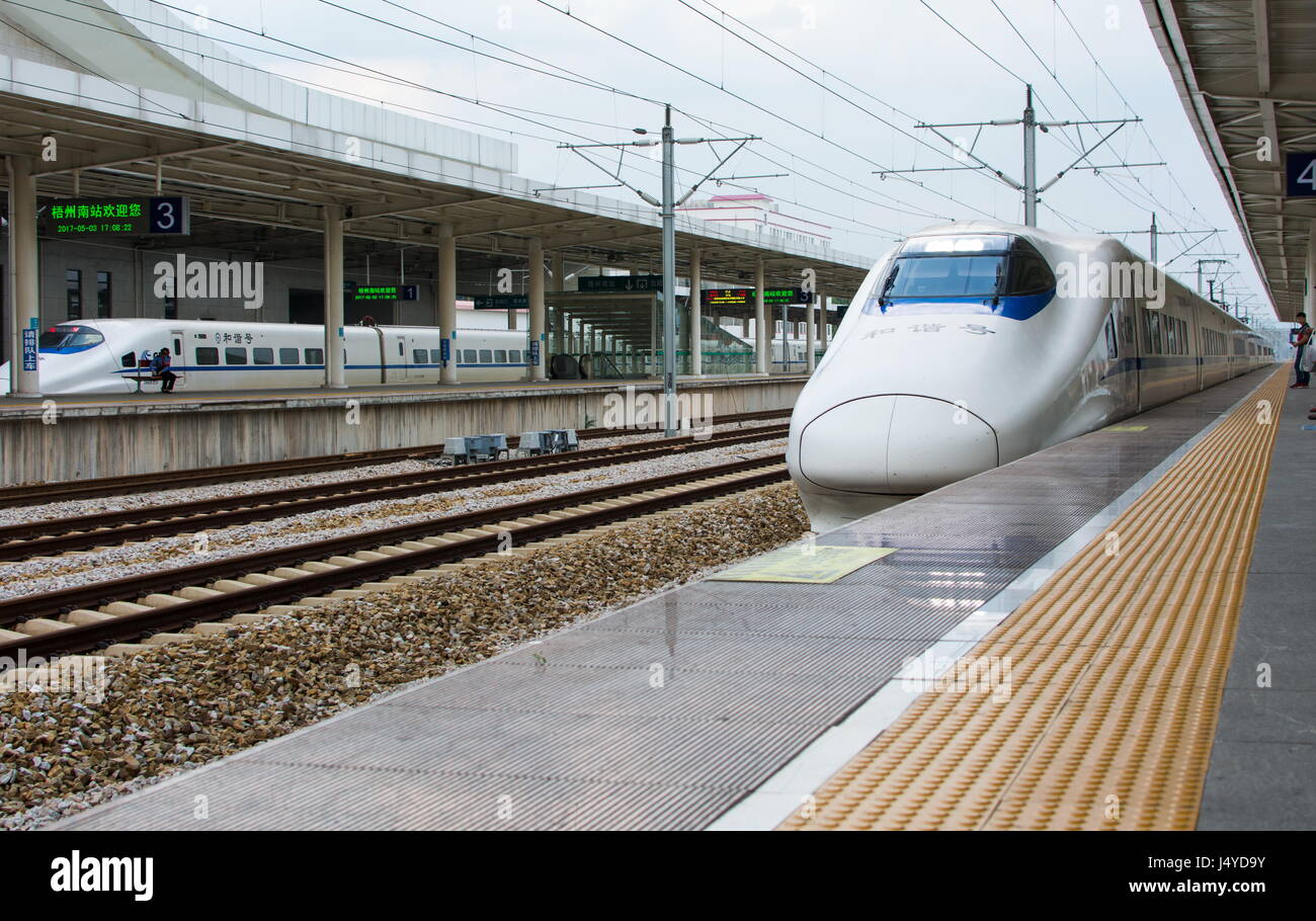 GUANGZHOU, CHINA - MAY 3, 2017: Chinese highway high speed train arriving at the train station Stock Photo