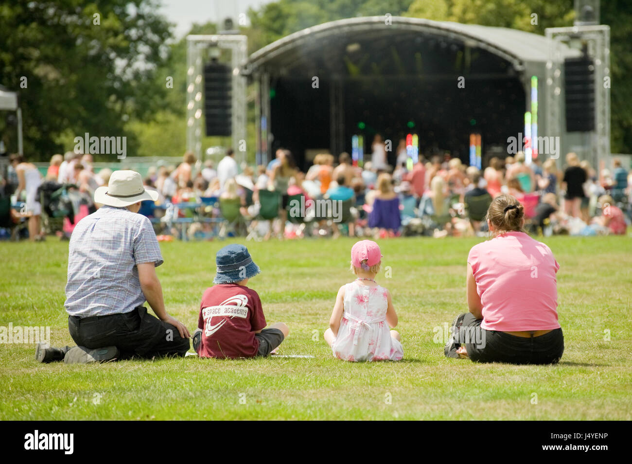 Family of four attending a summer music festival in Yateley, UK on July 2, 2011 Stock Photo