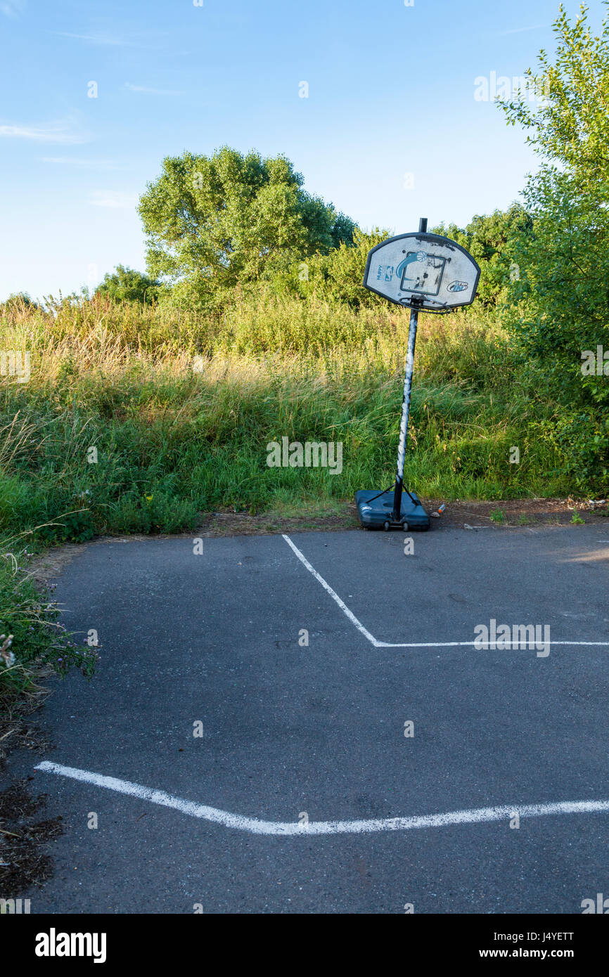 Old and abandoned basketball hoop on wasteland, Nottinghamshire, England, UK Stock Photo