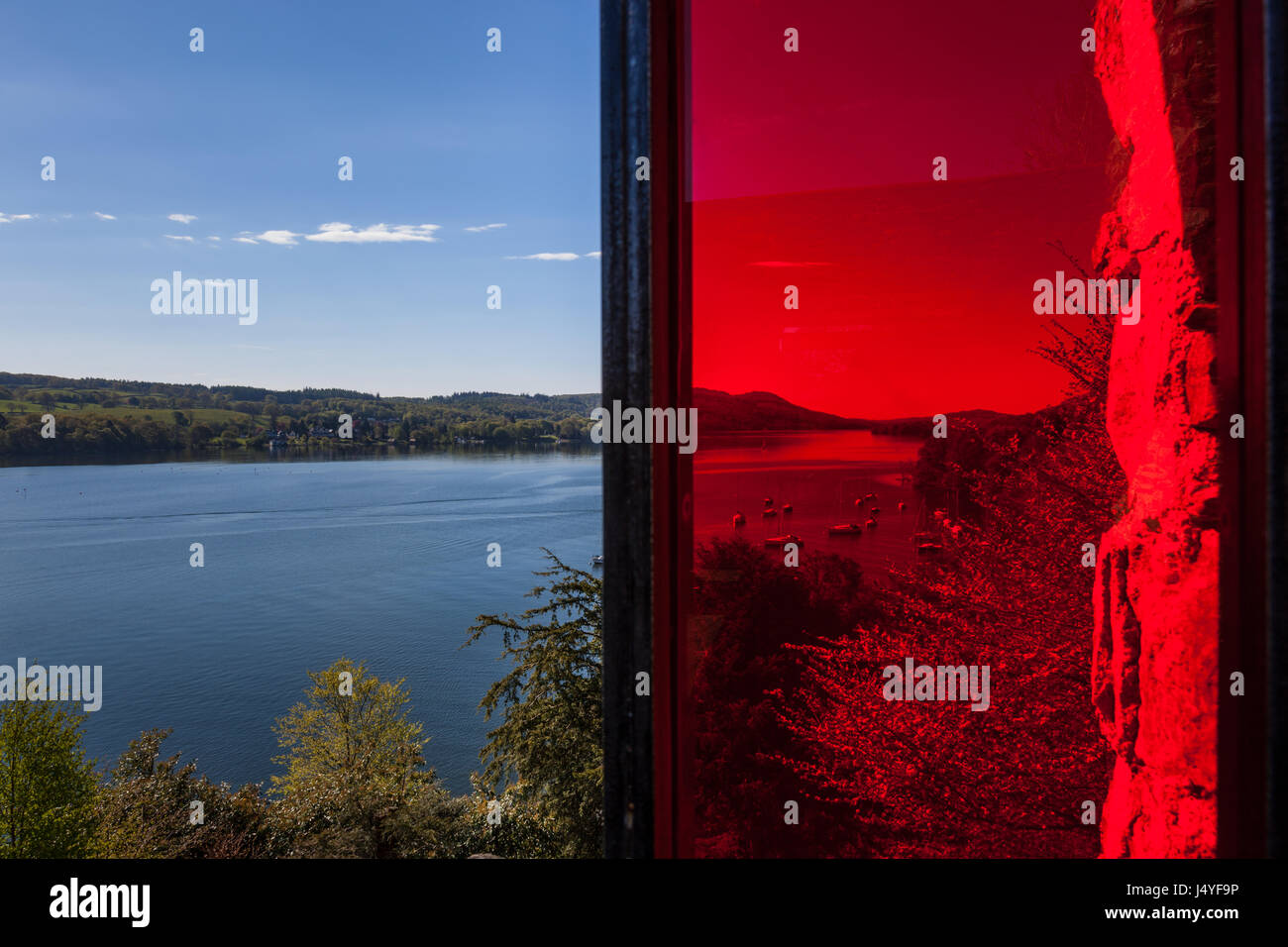 Looking south down Windermere, through the stained glass of the Claife Viewing Station near