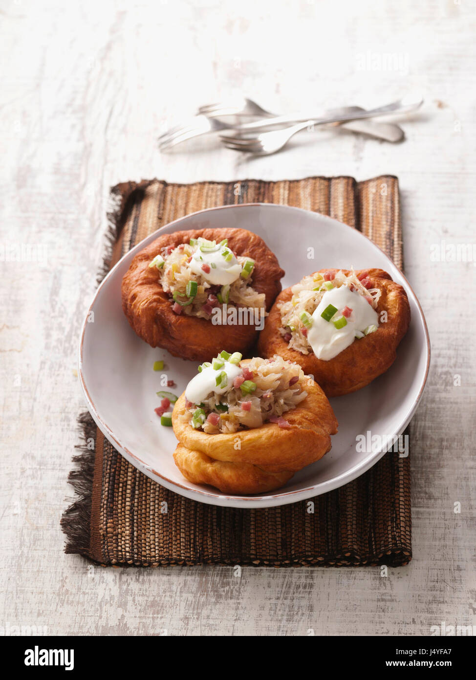 Deep fried yeast dougnuts with herbal filling Stock Photo Alamy