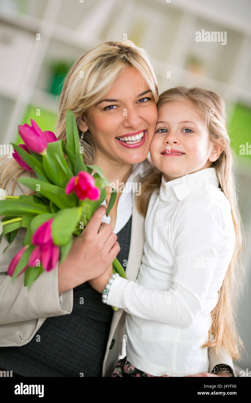 Happy Mom With Her Daughter Lovely Hug On Mother S Day Stock Photo Alamy