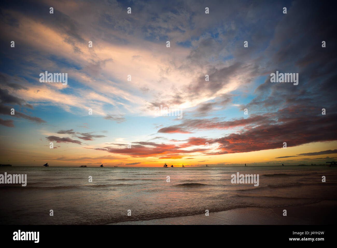 Beautiful sunset with sun over sea Stock Photo - Alamy