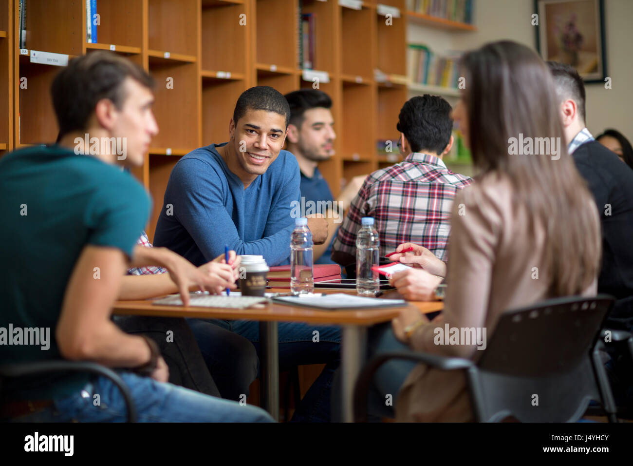 Black man studying in library hi-res stock photography and images - Alamy