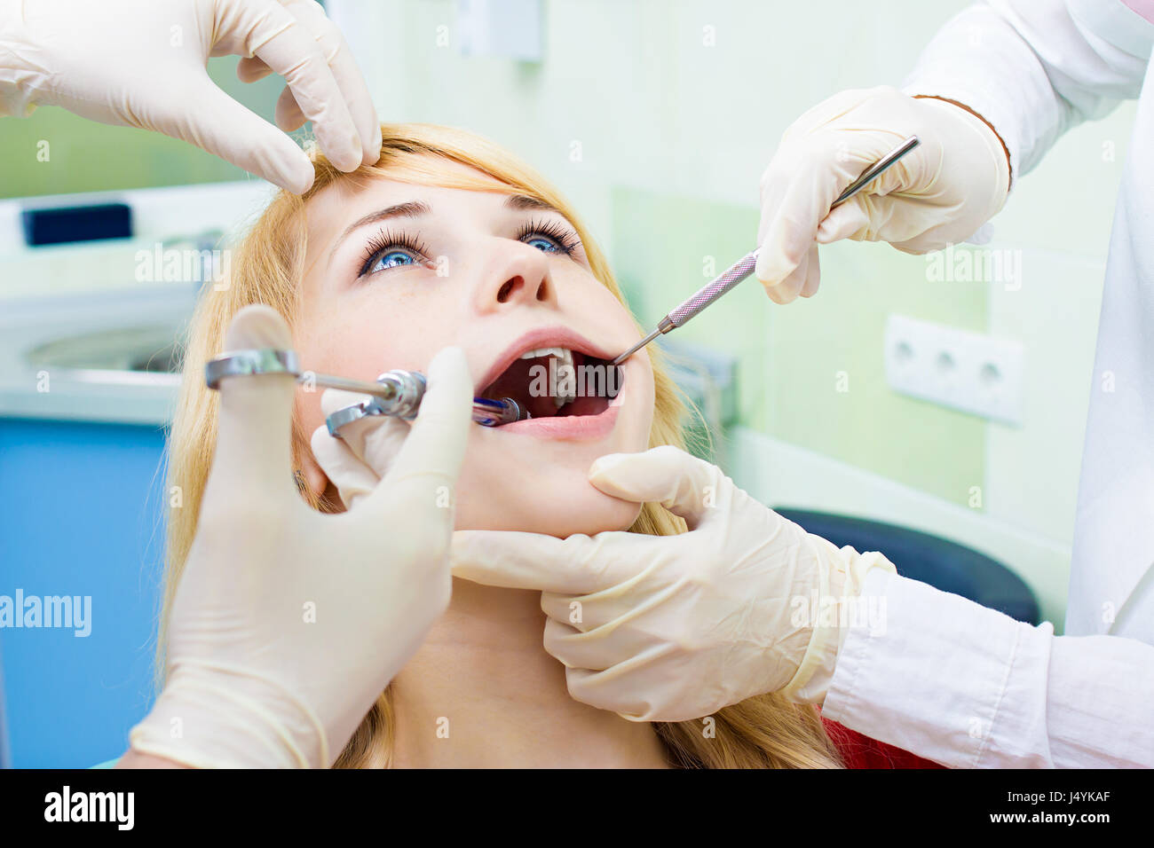 Woman open wide dentist hi-res stock photography and images - Alamy