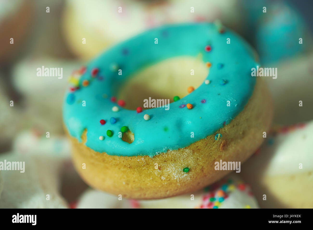 Delicious pretzels with blue glaze Stock Photo Alamy